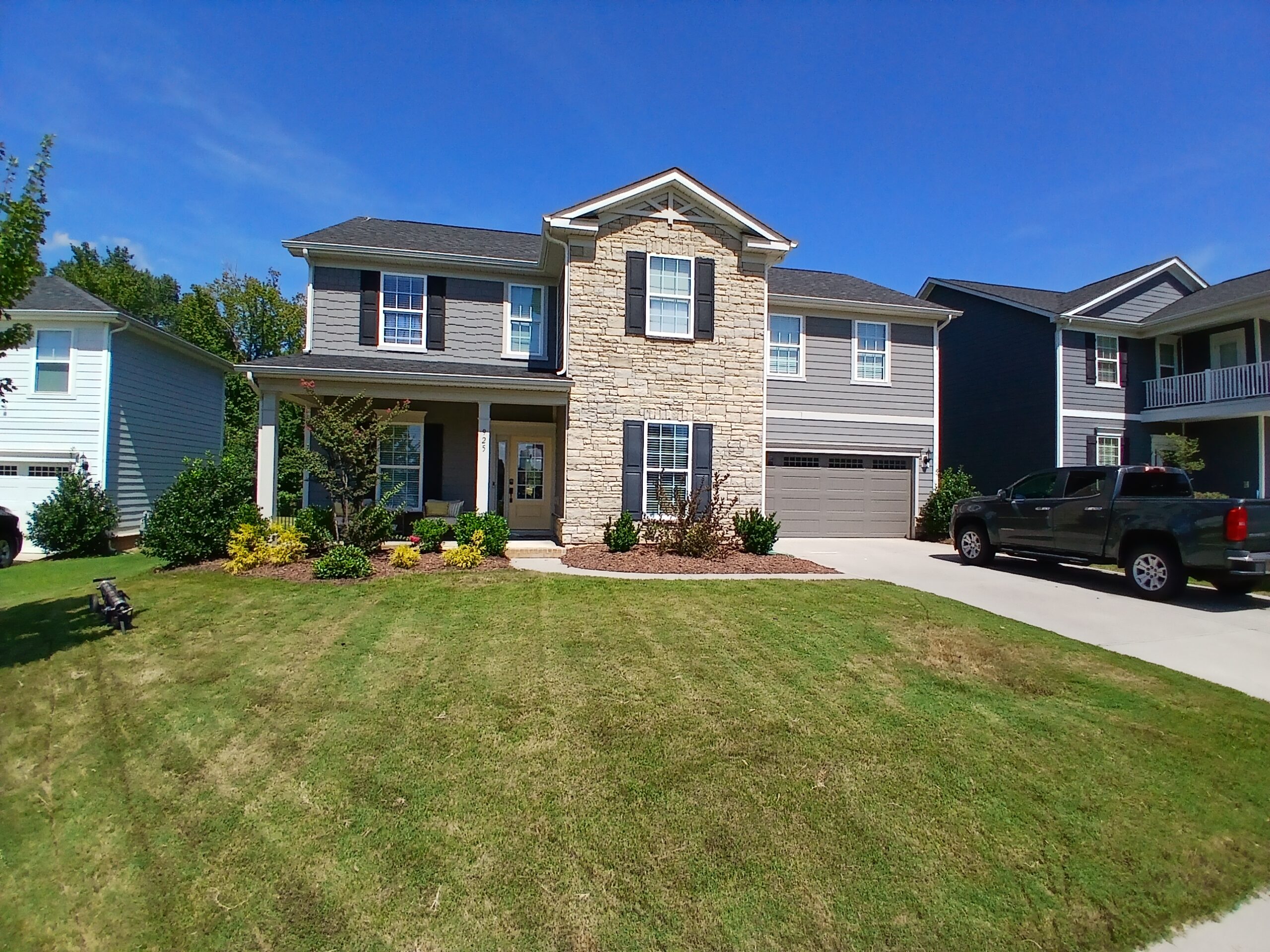 Hardie board house washing and exterior window cleaning in Southstone Matthews NC